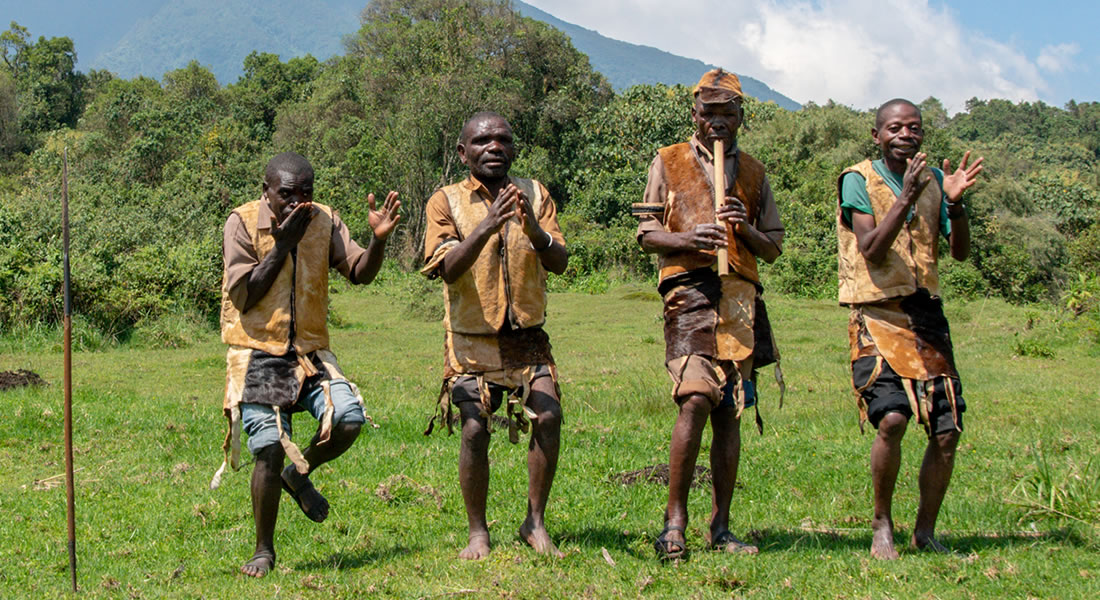 Batwa men dancing